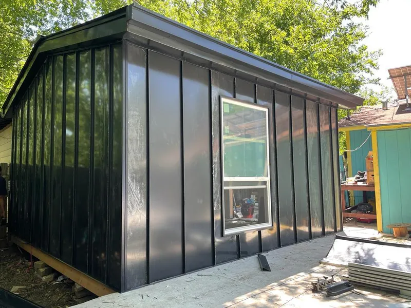 Black standing seam metal wall panels for Roof Inspection in Hartford